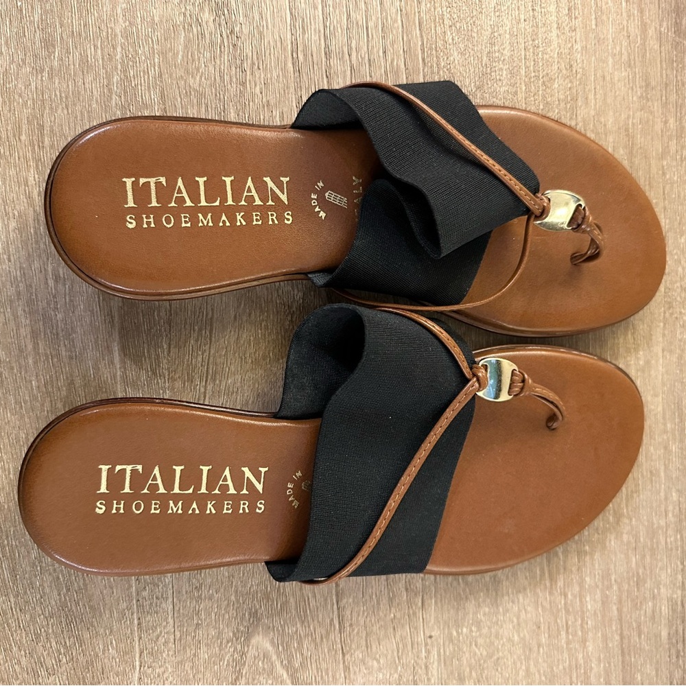 Like new Italian flats. Brown with black elastic strap and gold detail.